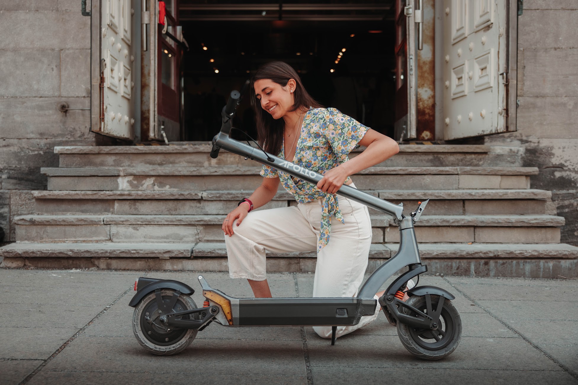 a women with an electric scooter