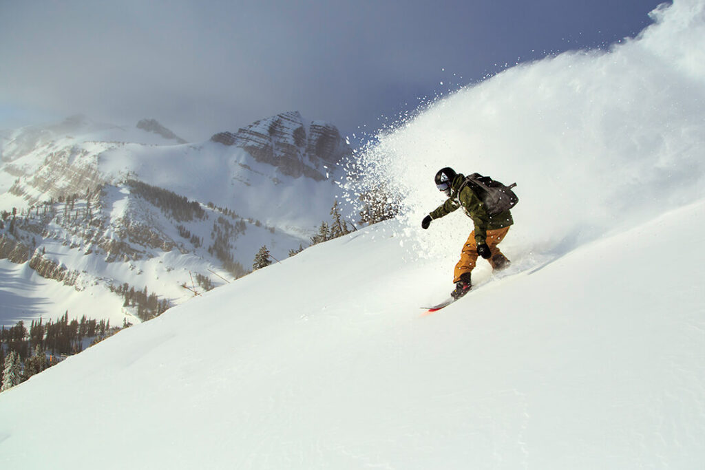 snowboarder in powder snow